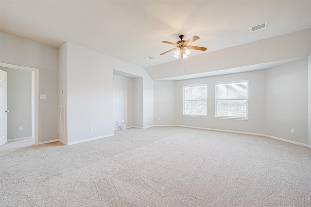 carpeted empty room with ceiling fan