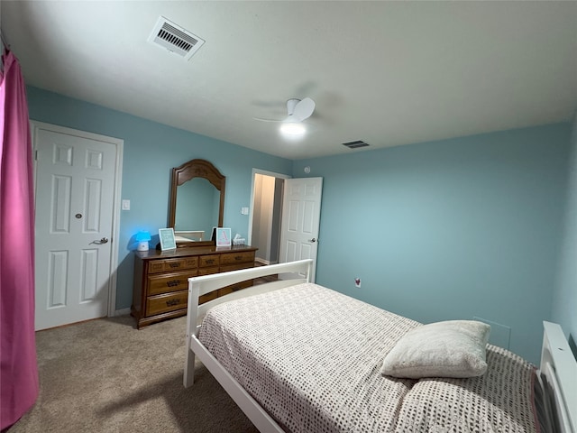 carpeted bedroom featuring ceiling fan