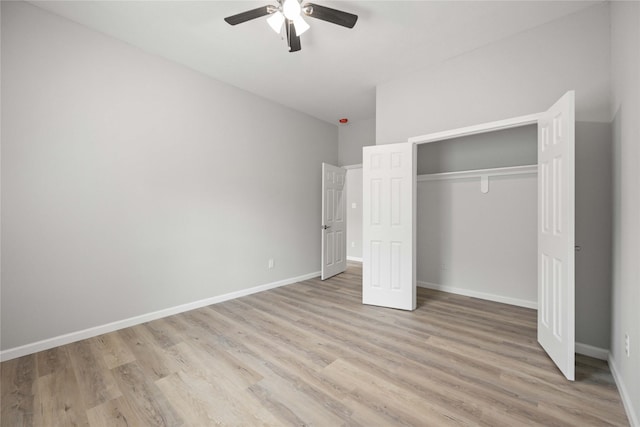 unfurnished bedroom with ceiling fan, light hardwood / wood-style floors, and a closet