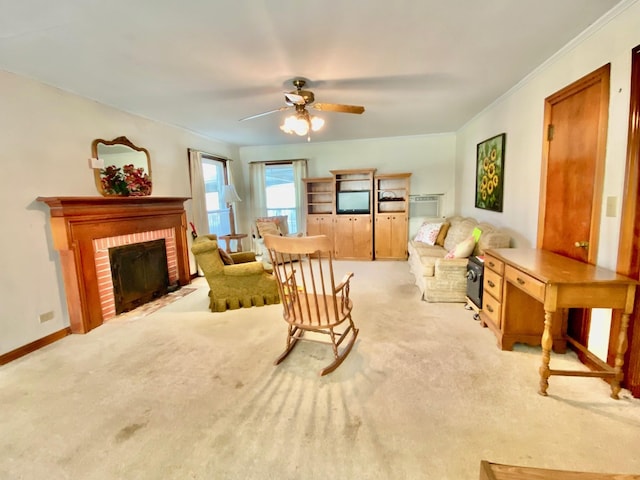 interior space with light carpet, crown molding, ceiling fan, and a brick fireplace