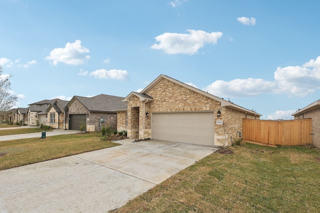 view of front of house featuring a garage and a front yard