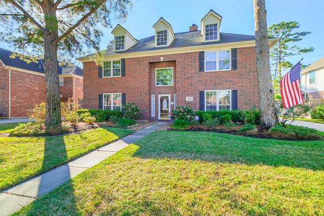 view of front of home featuring a front yard