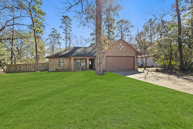 ranch-style home with a front yard and a garage