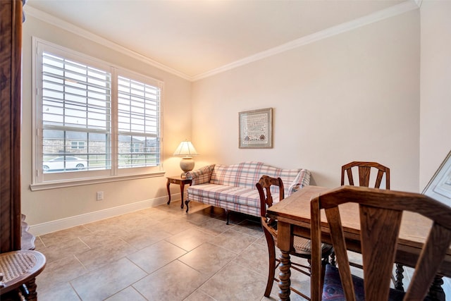 dining area with ornamental molding and light tile patterned floors