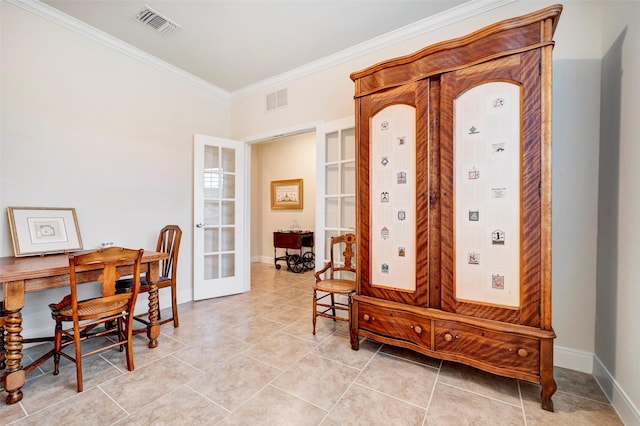 interior space with crown molding and french doors