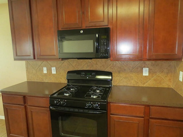 kitchen featuring decorative backsplash, light tile patterned flooring, and black appliances