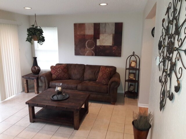 living room featuring light tile patterned floors