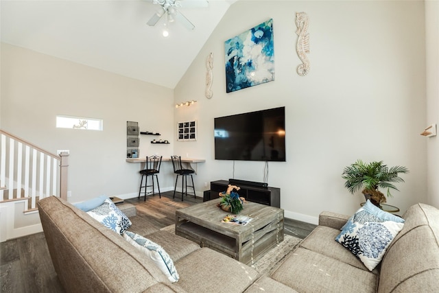 living room featuring hardwood / wood-style flooring, high vaulted ceiling, and ceiling fan