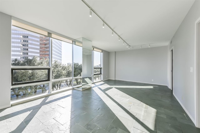 empty room with floor to ceiling windows