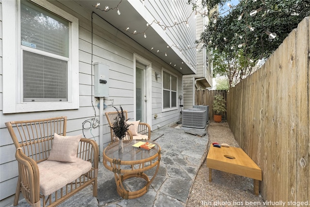 view of patio with central AC