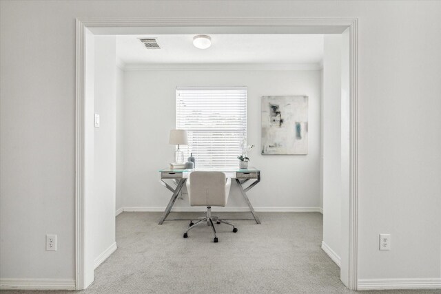 office featuring light colored carpet and ornamental molding