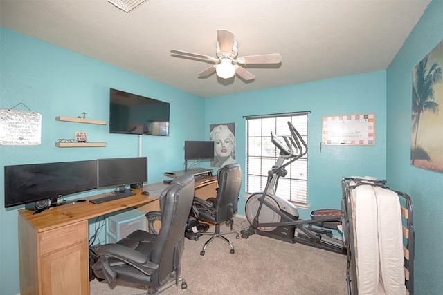 home office with light colored carpet and ceiling fan