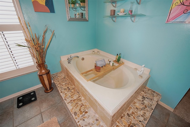 bathroom featuring tiled bath