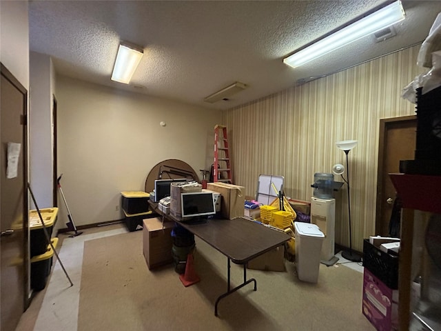 interior space featuring a textured ceiling