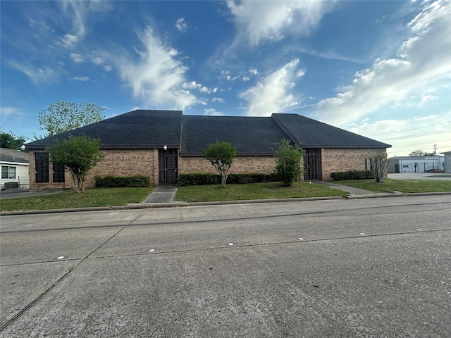 7555 Morley St, Houston, TX 77061 - single story home featuring roof with shingles and brick siding