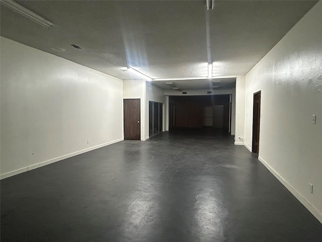 7555 Morley St, Houston, TX 77061 - interior space featuring concrete flooring and baseboards