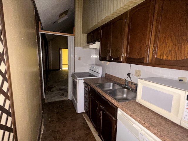 7555 Morley St, Houston, TX 77061 - kitchen with a sink, under cabinet range hood, tasteful backsplash, dark brown cabinetry, and white appliances