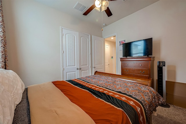 carpeted bedroom with ceiling fan