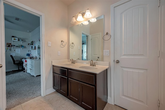 bathroom with vanity and tile patterned floors