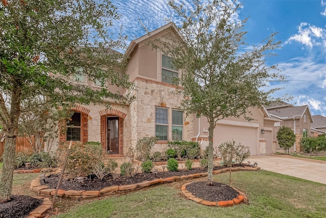 view of front of house with a garage and a front lawn