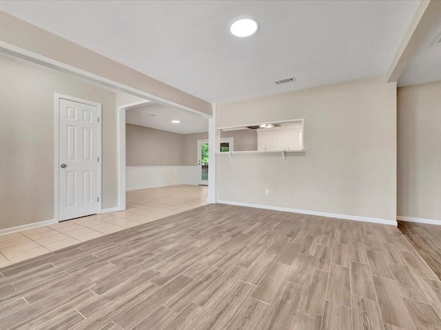 unfurnished living room with light hardwood / wood-style floors