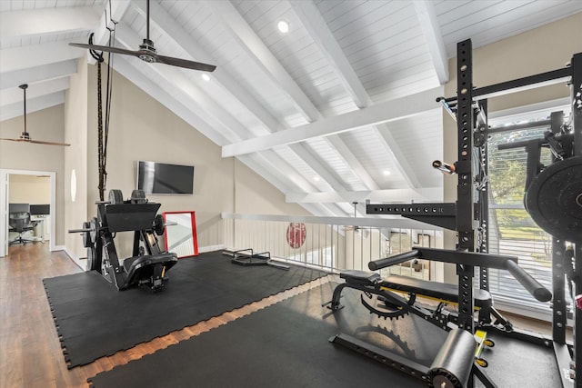 exercise area with ceiling fan, dark wood-type flooring, and lofted ceiling