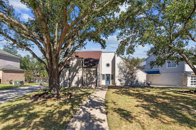 view of front of home with a front lawn