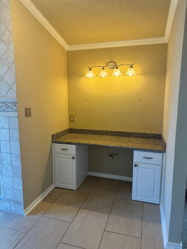 bathroom with tile patterned floors and crown molding