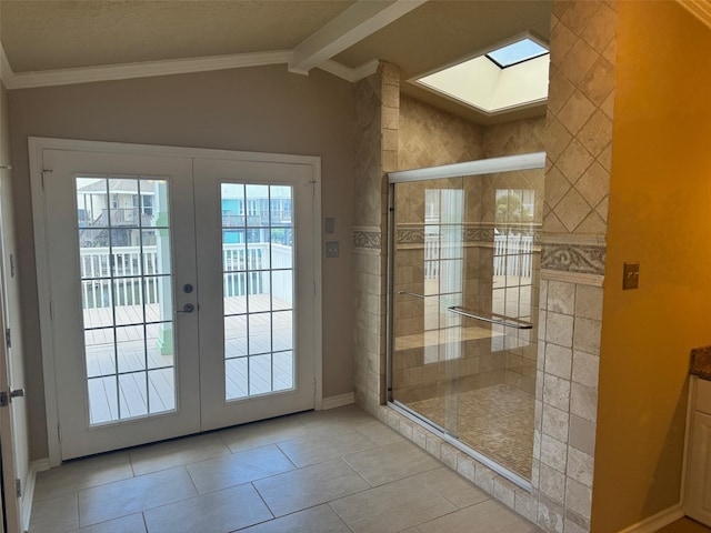 doorway with lofted ceiling with beams, light tile patterned flooring, crown molding, and french doors