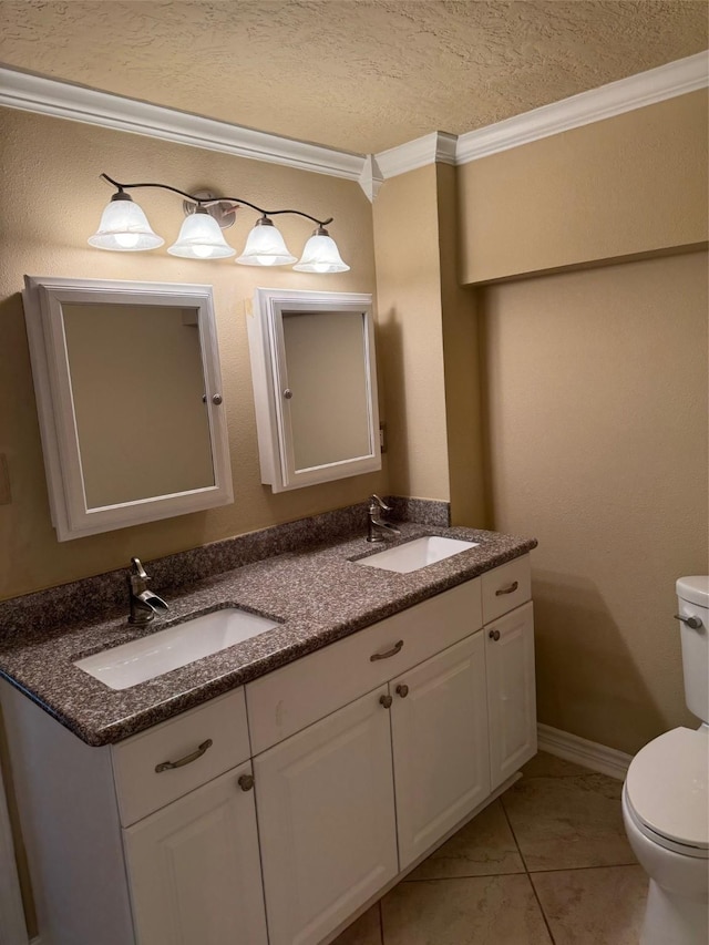 bathroom featuring tile patterned flooring, vanity, toilet, and ornamental molding