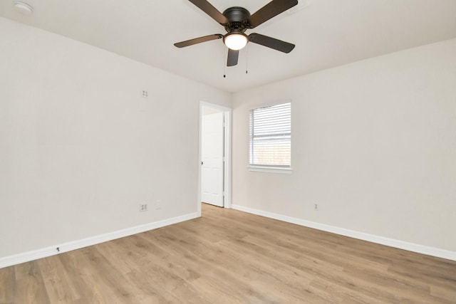 unfurnished room featuring ceiling fan and light hardwood / wood-style floors