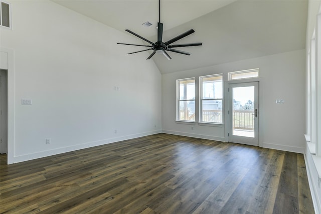 unfurnished room featuring dark hardwood / wood-style floors, ceiling fan, and high vaulted ceiling