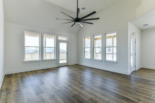 unfurnished room featuring ceiling fan, dark wood-type flooring, and high vaulted ceiling