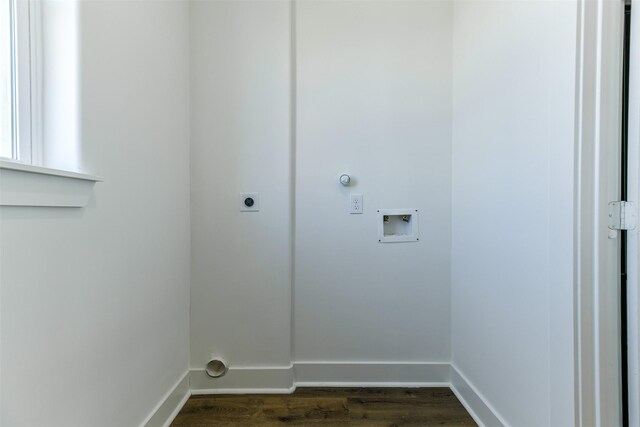 washroom featuring washer hookup, dark hardwood / wood-style flooring, and electric dryer hookup