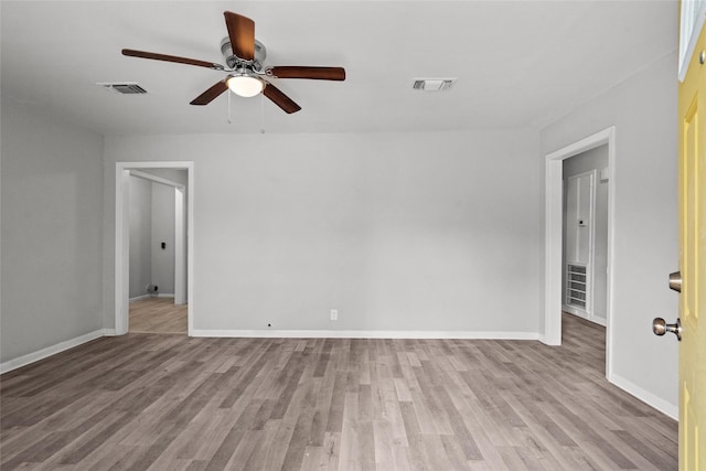 unfurnished room with ceiling fan and light hardwood / wood-style floors