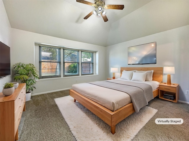 bedroom featuring dark colored carpet, ceiling fan, and lofted ceiling