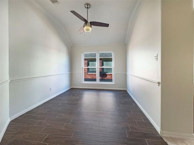 unfurnished room with ceiling fan, ornamental molding, and vaulted ceiling