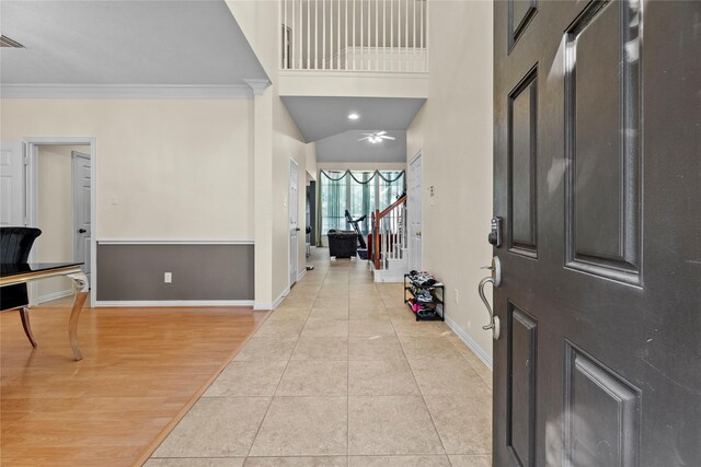 tiled entryway with crown molding