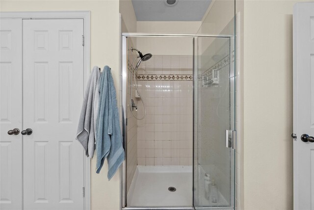 bathroom with an enclosed shower