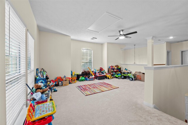 game room with carpet flooring and ceiling fan