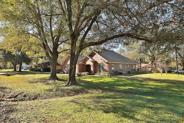 view of front of home with a front yard