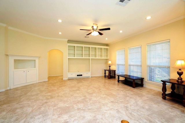 living area with ceiling fan and ornamental molding