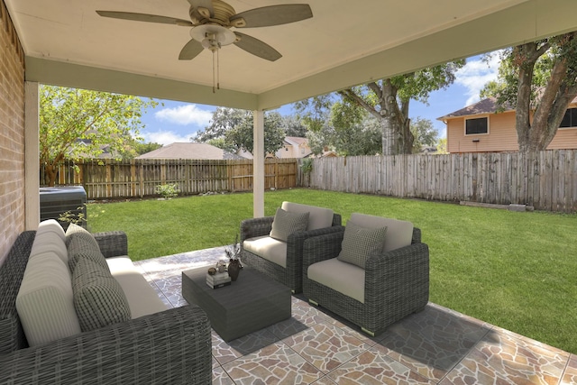 view of patio / terrace featuring ceiling fan