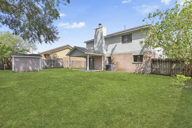 back of property featuring central AC unit, a storage unit, and a lawn