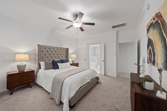 bedroom featuring connected bathroom, crown molding, ceiling fan, and light colored carpet