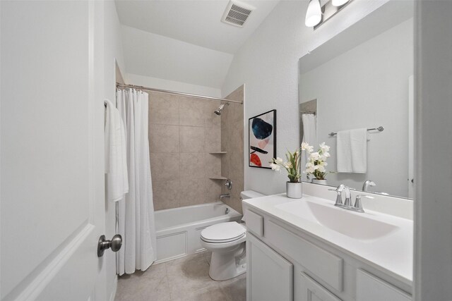 full bathroom with tile patterned floors, lofted ceiling, toilet, shower / tub combo with curtain, and vanity