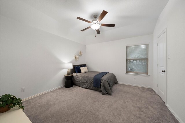 bedroom featuring light carpet and ceiling fan