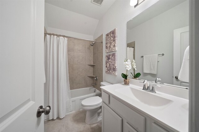 full bathroom with shower / bath combo, toilet, lofted ceiling, and vanity