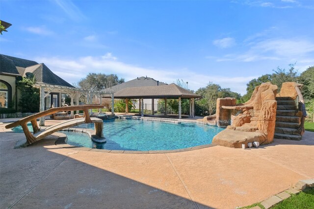 view of pool with a gazebo and a patio area