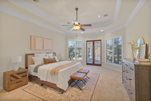 carpeted bedroom featuring french doors, access to outside, a raised ceiling, ceiling fan, and crown molding